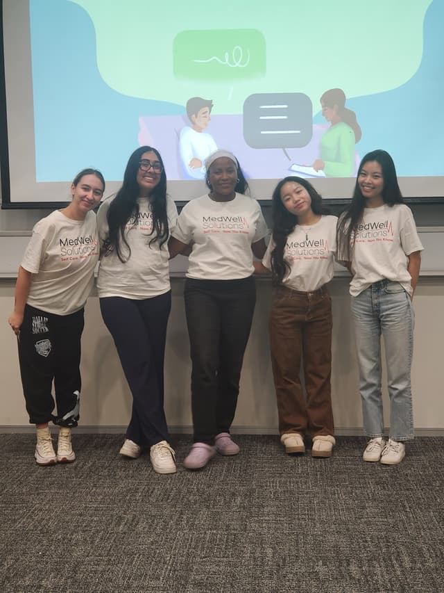 Medwell student volunteers in Medwell Solutions shirts